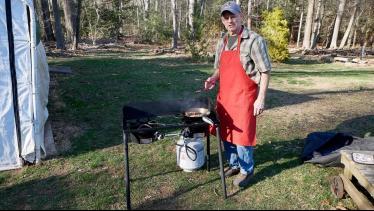 Cooking freshly caught trout using the Camp Chef E